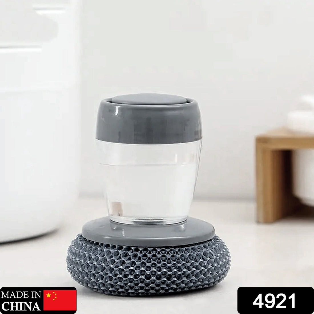 Versatile soap dispensing dish brush, easy to use and refill
