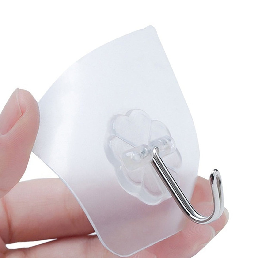 Small strong adhesive wall hooks in stainless steel for versatile use